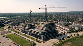 May Construction Update at Realm: Building Momentum, One Floor at a Time