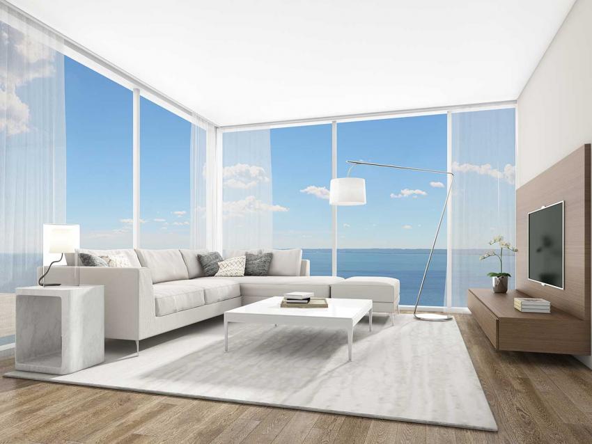 Floor-to-ceiling windows regale living spaces with light and seemingly endless views